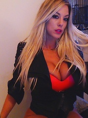 Gisele dresses up in hot black leather and hot lipstick as she strips down and works her body